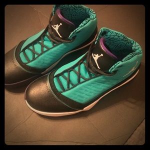 Turquoise with purple highlight Jordans