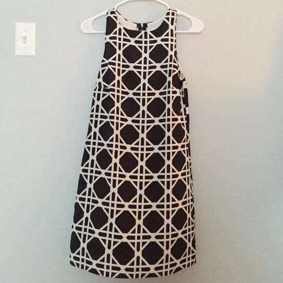 Black and white patterned dress. Designer: Everly.