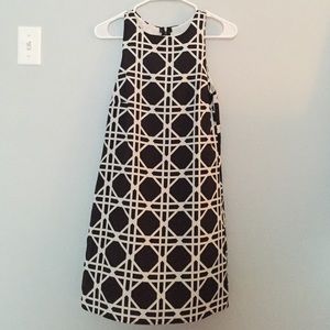 Black and white patterned dress. Designer: Everly.