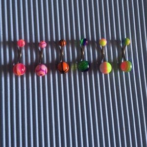 6 belly button piercings