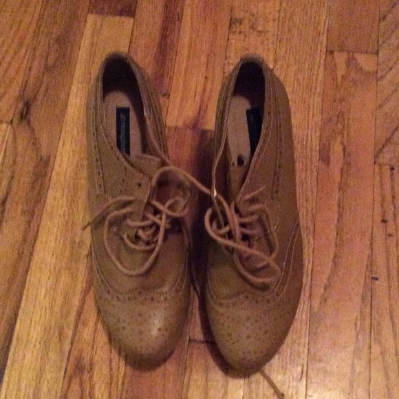 Beige platform oxfords.