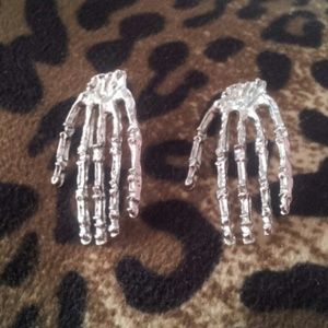 Skull hand earrings