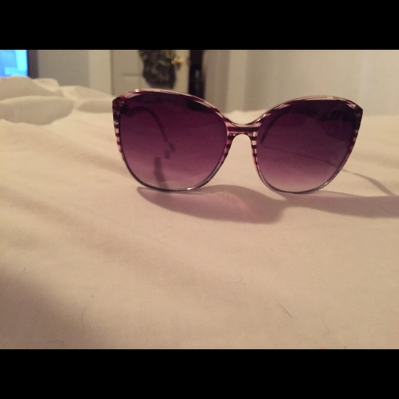 Brand new without tags purple sunglasses