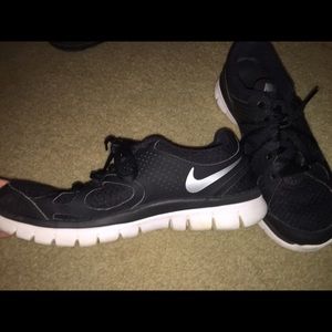 Nike Tennis Shoes. Few scuff marks.