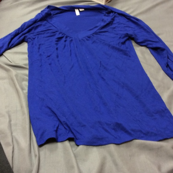 Just a blue loose fitting top. - Picture 1 of 1