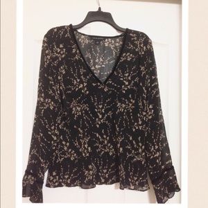 Banana Republic Black and Tan flower print.