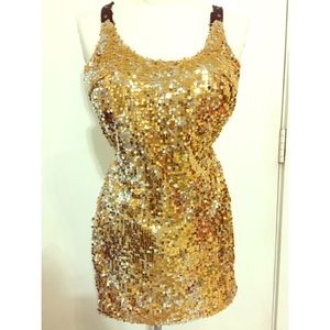 Gold sequins dress.