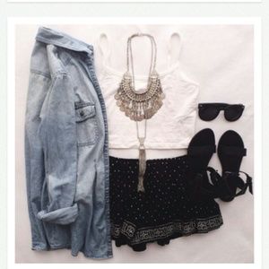 Halter White Crop Top, Black Shorts, Jean Jacket.