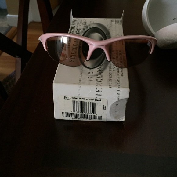 Pink Oakley sunglasses.