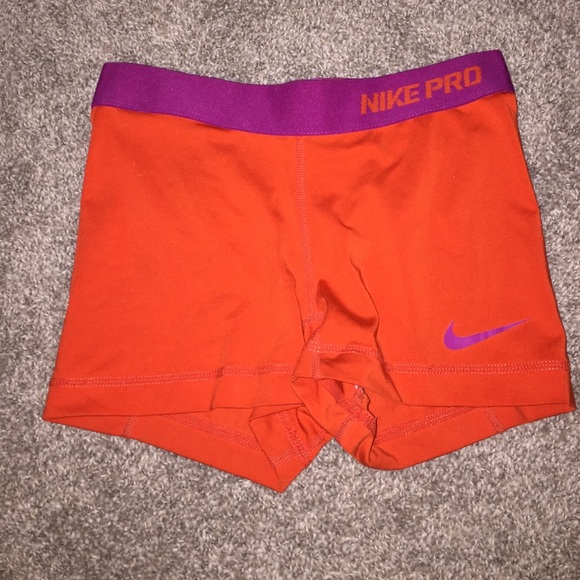 Orange and Purple Nike Pros