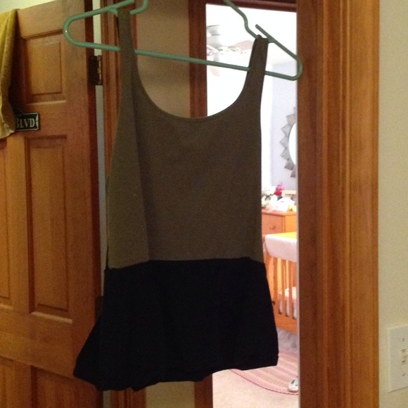 Green and black peplum top
