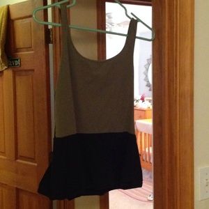 Green and black peplum top