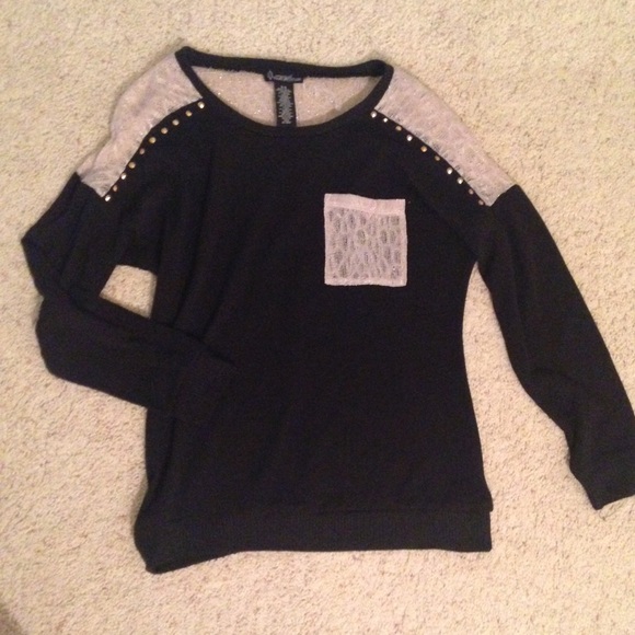 Black knit with gold studs and cream lace details