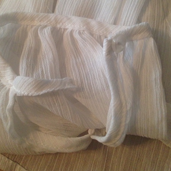 Cute white sheer long sleeve shirt with designs. - Picture 2 of 2