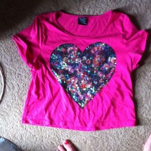 Pink t shirt with floral shiny heart in the middle