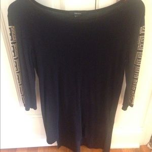 black shirt studded arms