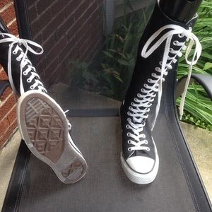Knee high Converse tennis shoes