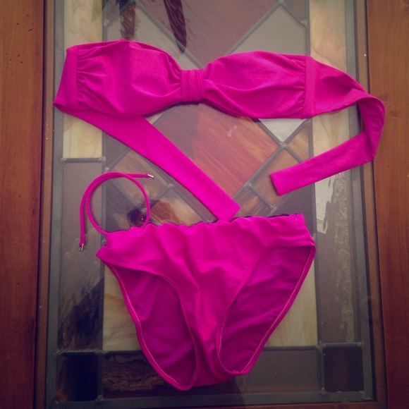 Hot pink swimsuit, bandeau style. Sunsets