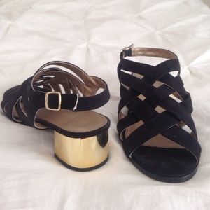 Black suede and gold wedges