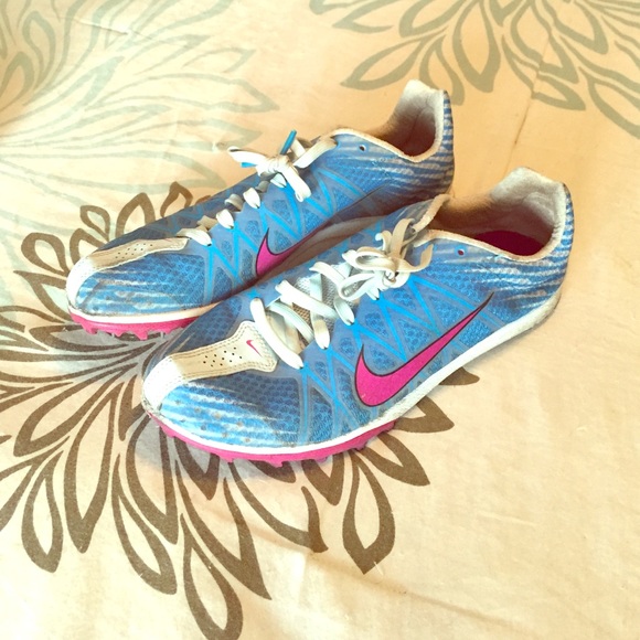 Woman's Nike cleats pink blue