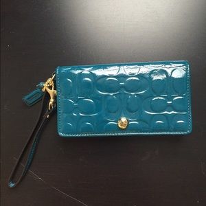 NWOT teal patent leather Coach wristlet/wallet