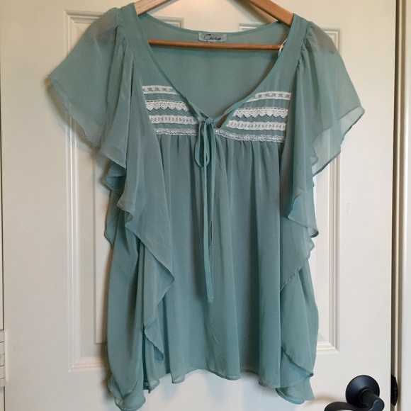 Flowy chiffon Tiffany Blue top with lace.