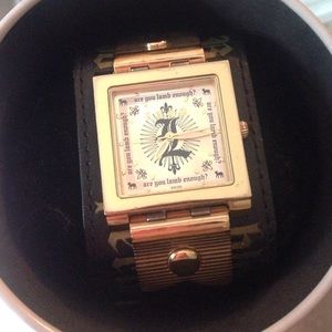 Black and gold LAMB watch