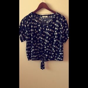 black boxy top. with crows on branches.