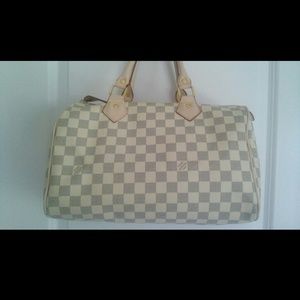 Cream speedy bag with lock/no key