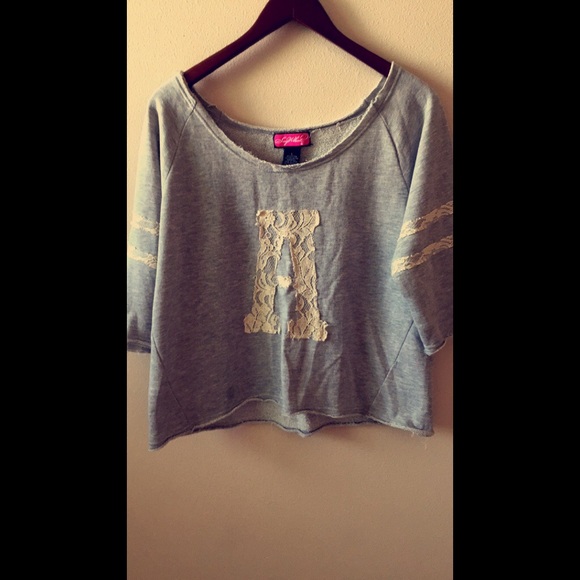 high low varsity sweater. light gray.