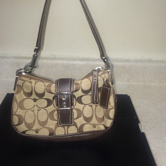 Brown and tan small coach handbag