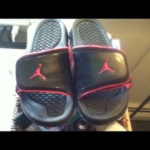 Black and white Jordan slides