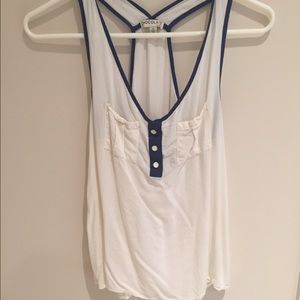 Racer back; eggshell with navy lining