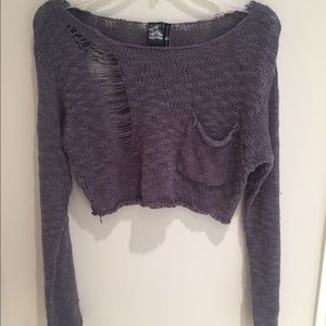 Distressed, cropped sweater