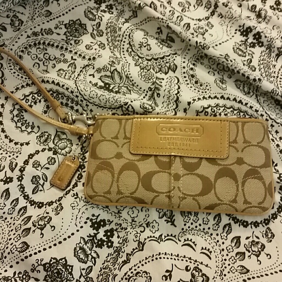 Beige Coach wristlet