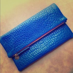 Clare V. Fold over clutch