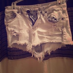 Distressed light denim high waist shorts