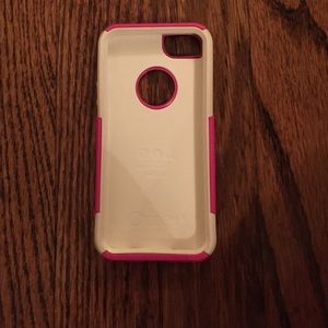 White and pink otter box case for the iPhone 5/5s