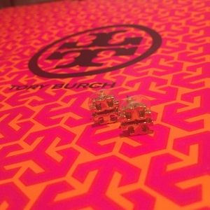 Tory Burch Logo Studs in gold.