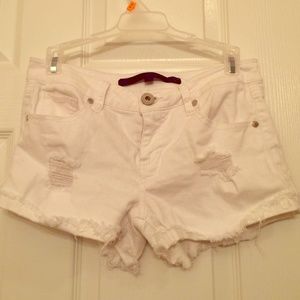 Distressed white shorts