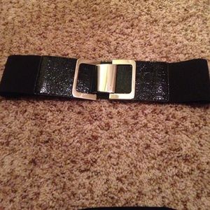 Black and silver belt 3.5 inches wide.
