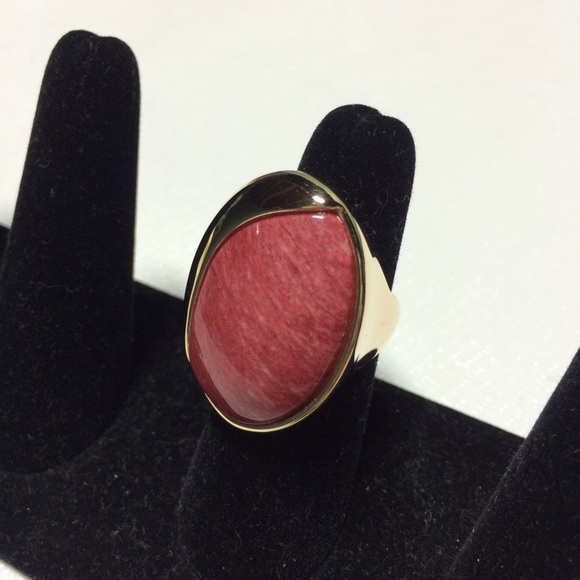 Huge real red stone on gold plated ring