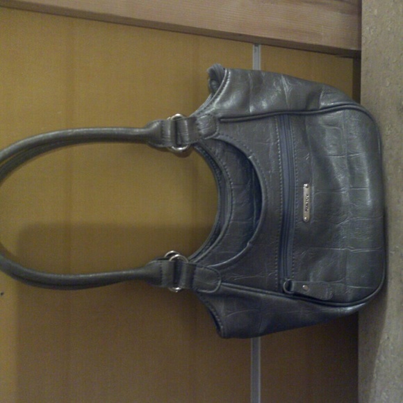 Silver bag w/many pockets NEW