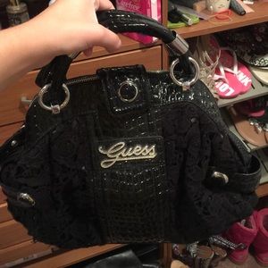 Black laced Guess purse