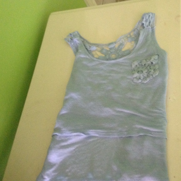 Blue crop top with a flowy back