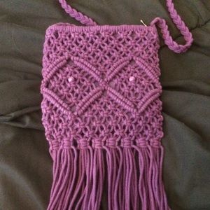 small purple woven style purse