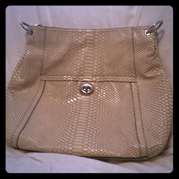 Cream colored Coach bag