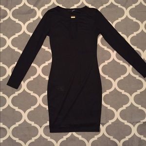 Black long sleeve mini dress.
