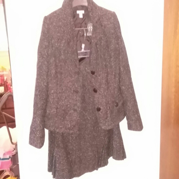 Cute, stylish and sassy brown tweed suit.  A must.