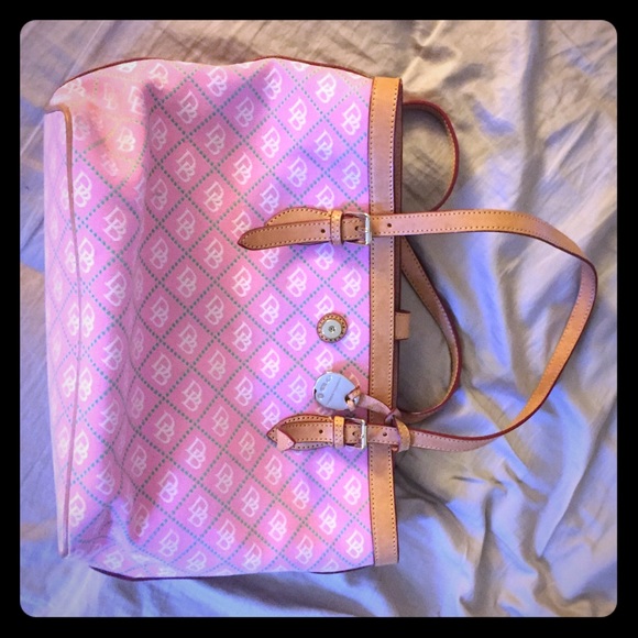 A beautiful authentic pink Dooney &Bourke purse.